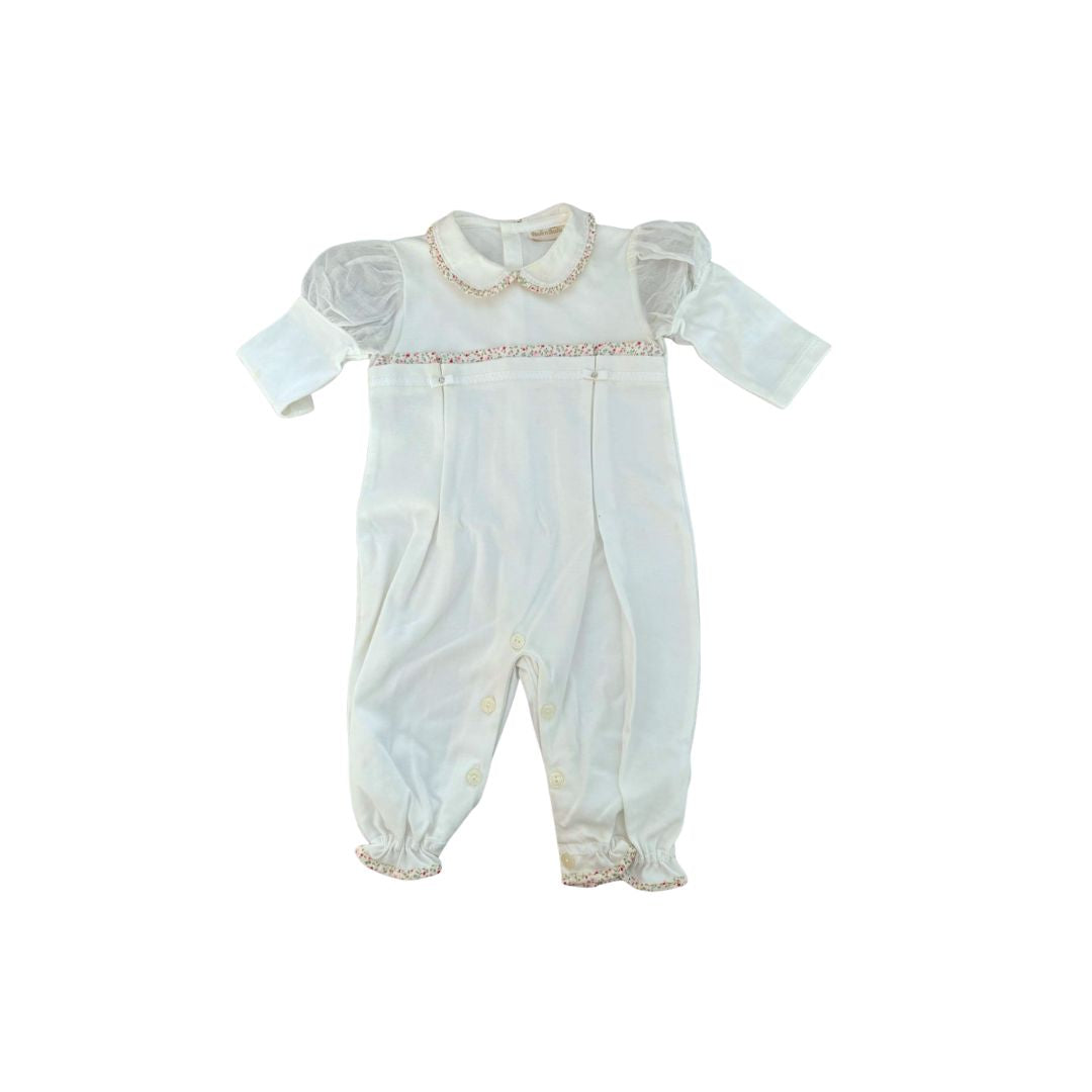 Deliziosa tutina per neonata